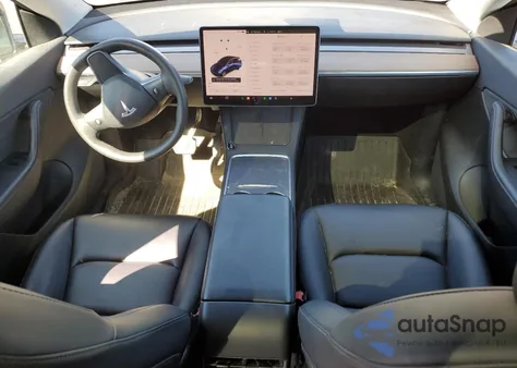 2022 Tesla Model Y из США, поврежденный, VIN 7SAYGDEE1NF318022